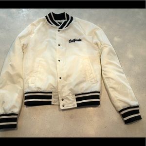 White and black varsity bomber jacket